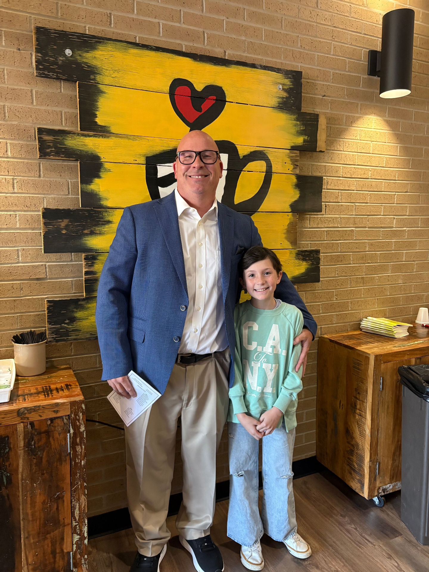 Owner of Titan Property Investors with his daughter in Arkansas